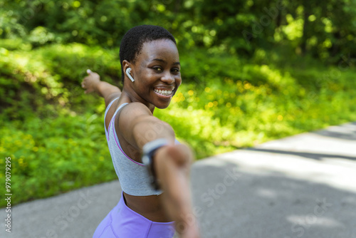 Happy, portrait and woman breathing in nature with wellness, peace and calm energy from workout or cardio exercise. Outdoor, fitness and athlete with a smile for training in environment or park.