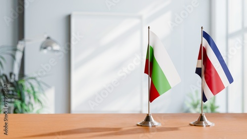 FLAGS OF BULGARIA AND COSTA RICA ON TABLE