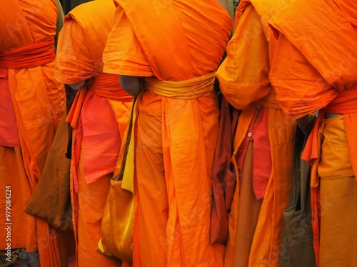 bright organge dresses from the monks in laos