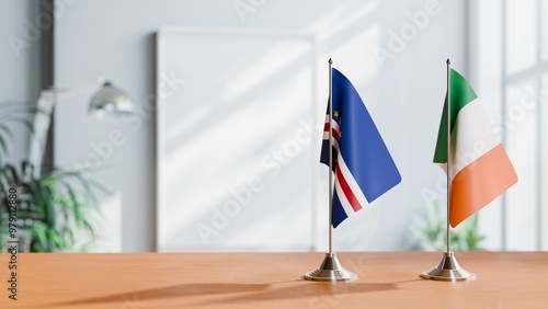 FLAGS OF CAPE VERDE AND IRELAND ON TABLE photo