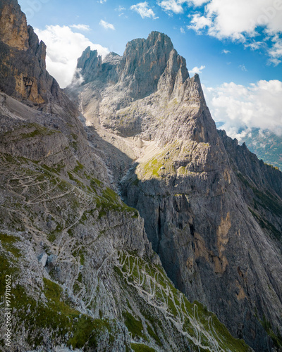 Aerial drone view The Dolomites mountain valley with hiking path, Province of Trento, South Tirol, Italy photo