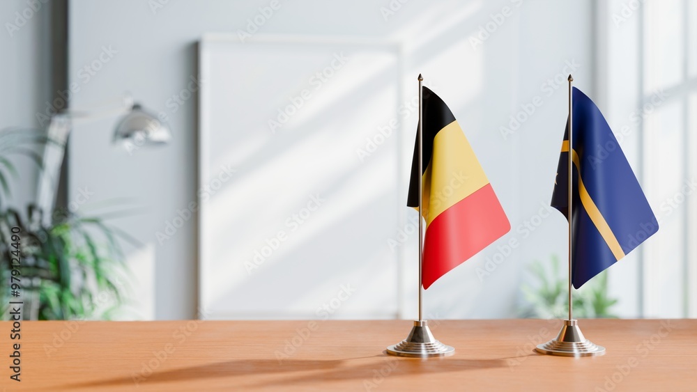FLAGS OF CHAD AND NAURU ON TABLE FLAGS OF CHAD AND NAURU ON TABLE