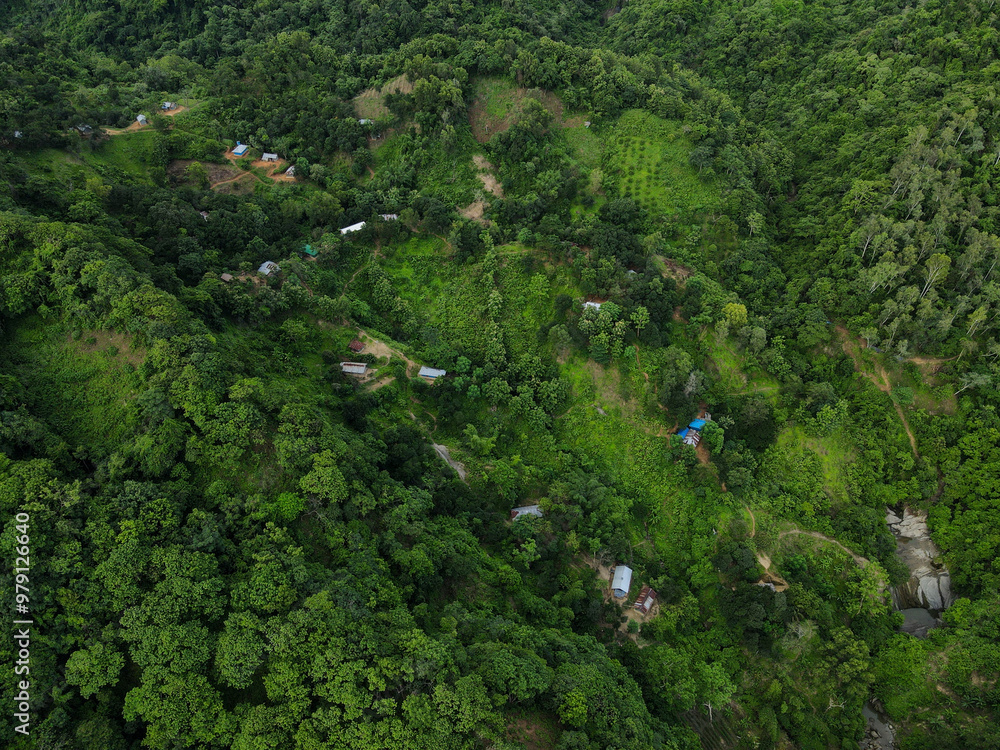 Aerial view of lush greenery and homes in the Chittagong hills, Chittagong, Bangladesh.