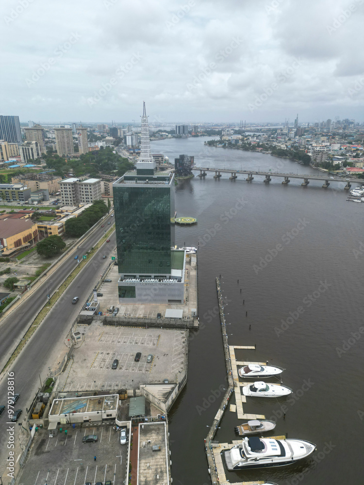 Aerial view of a beautiful urban skyline with skyscrapers, a river, and a bridge, Lagos, Nigeria. Aerial view of a beautiful urban skyline with skyscrapers, a river, and a bridge, Lagos, Nigeria.