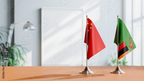 FLAGS OF CHINA AND ZAMBIA ON TABLE