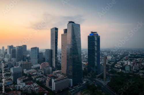 Wallpaper Mural Aerial view of beautiful skyline at sunrise featuring modern skyscrapers along Paseo de la Reforma, Miguel Hidalgo, Mexico City, Mexico. Torontodigital.ca