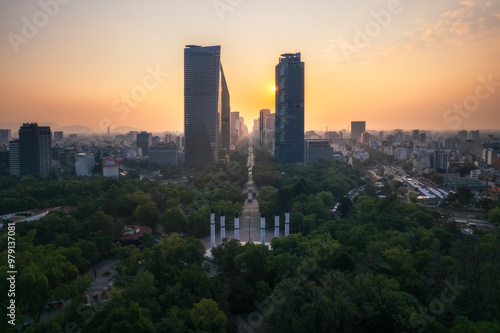 Aerial view of the vibrant skyline and majestic Castillo de Chapultepec surrounded by Bosque de Chapultepec park at sunrise, Miguel Hidalgo, Mexico. photo