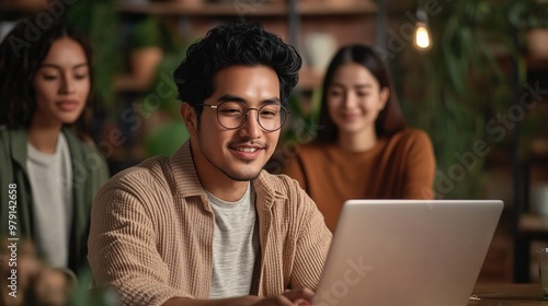 Gen Z entrepreneur working in minimalist office with laptop