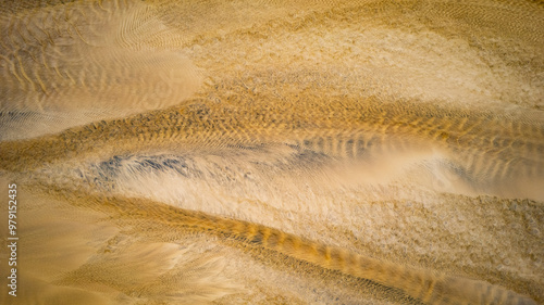 Aerial view of abstract sand patterns on eoropie beach, ness, isle of lewis, scotland. photo