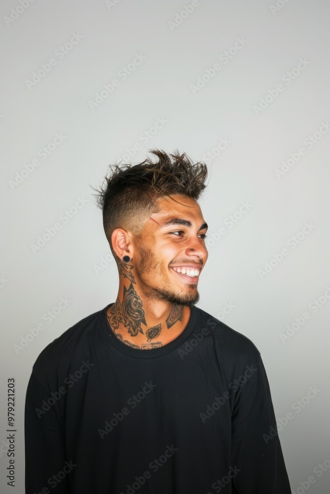 Fototapeta premium Tattooed man smiling confidently