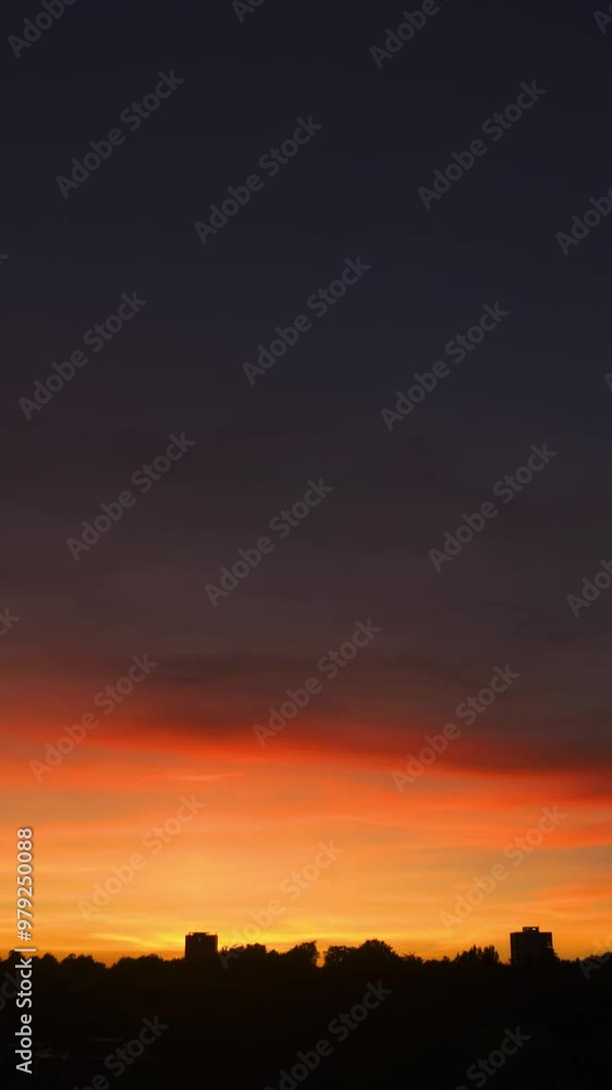 Light fades away from a red sky sunset.
Speeded-up twilight. Fades to black. Vertical format. Light fades away from a red sky sunset.
Speeded-up twilight. Fades to black. Vertical format.