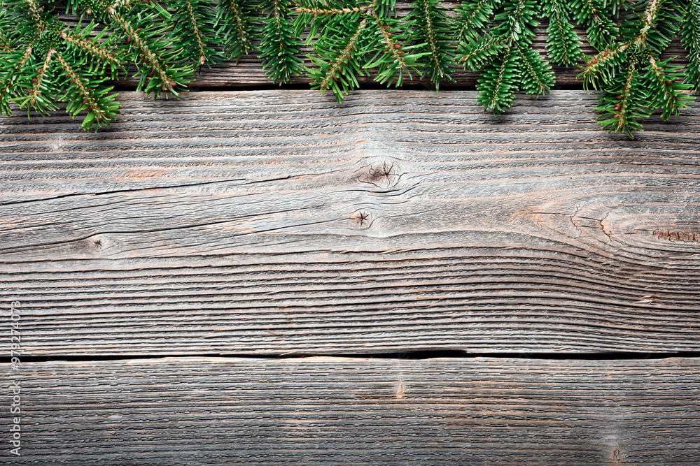 Christmas or New Year background with a border of green fir tree branches. Rustic wooden Ornament Border Background Christmas or New Year background with a border of green fir tree branches. Rustic wooden Ornament Border Background