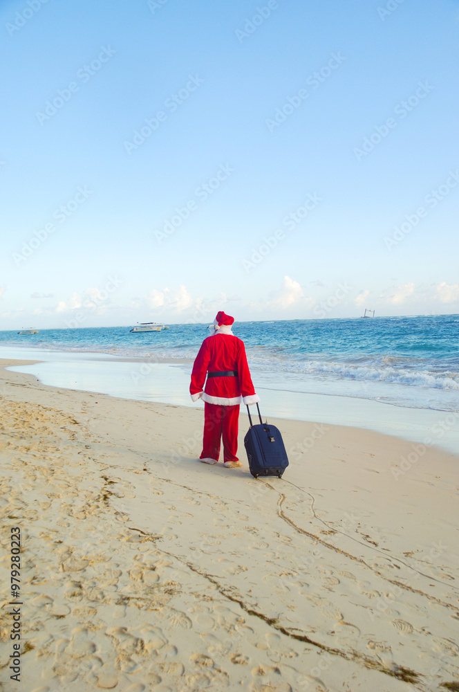 Santa Claus is on vacation on a tropical beach. Santa Claus is on vacation on a tropical beach.