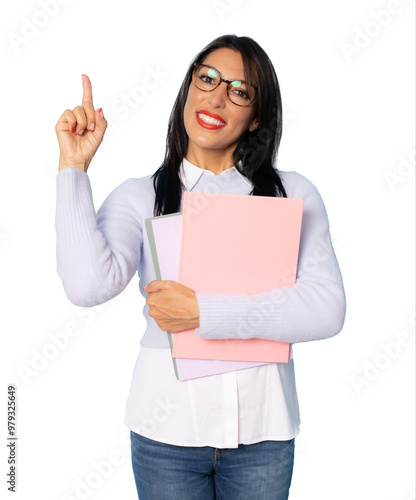 Smiling woman holding books. isolated portrait of school teacher pointing finger up isolated over transparent background.