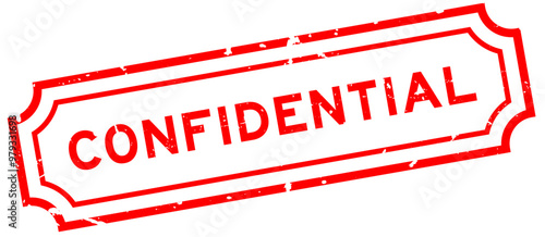 Grunge red confidential word rubber seal stamp on white background
