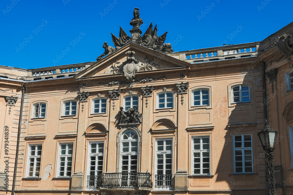 Historic architecture of a grand building in Warsaw during a clear blue sky Historic architecture of a grand building in Warsaw during a clear blue sky