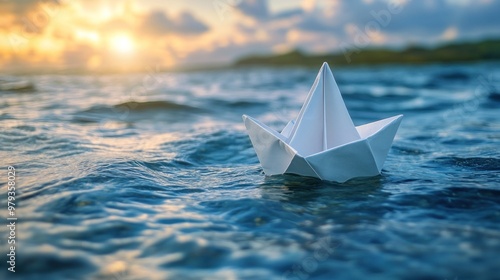 Paper Boat on the Ocean at Sunset