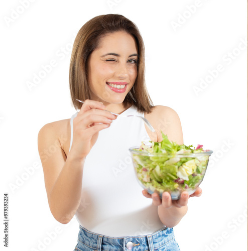 Portrait of young happy woman eating salad over transparent background. healthy lifestyle with green food.