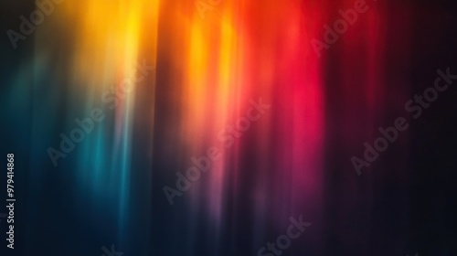 A vibrant abstract background featuring blended hues of orange, yellow, red, pink, and blue, creating a dynamic visual appeal. photo