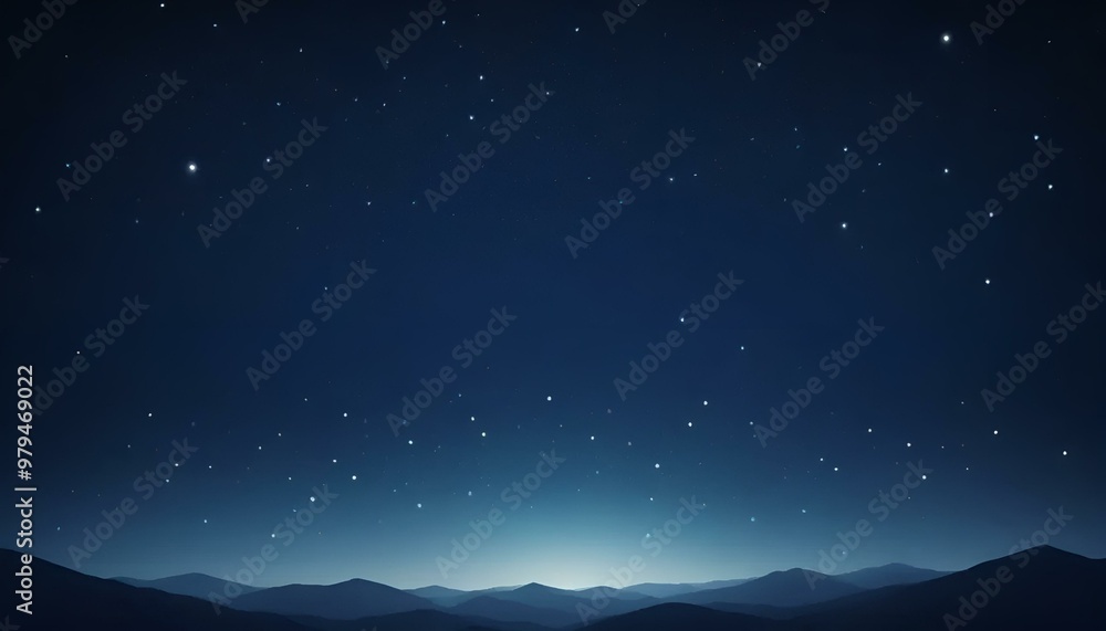 Obraz premium Starry night sky over silhouettes of distant mountains creating a serene backdrop