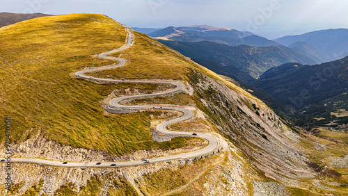 Aerial drone footage of  Sureanu mountains, Alba county, Transalpina, Transylvania, Romania. Romanian wild nature and landscape from above. Drone photography. Transalpine road in Romania.  photo