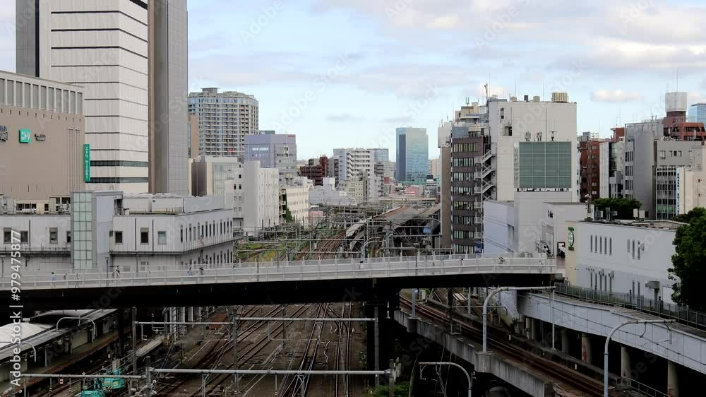 Shinjuku Ward, Tokyo, May 20, 2023. Scenery such as trains on the south side of Shinjuku Station seen from Busta Shinjuku. Shinjuku Ward, Tokyo, May 20, 2023. Scenery such as trains on the south side of Shinjuku Station seen from Busta Shinjuku.