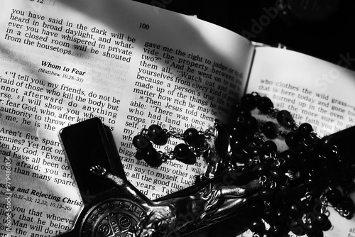 Bible text page close up with objects black and white