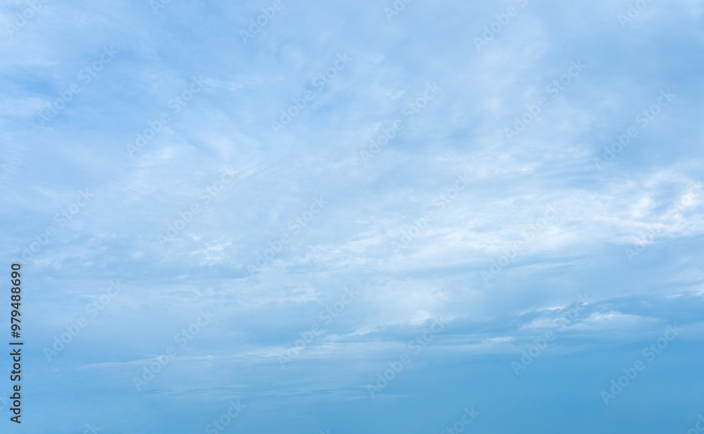Beautiful blue sky with fluffy white clouds, a breathtaking nature scene under the bright sunlight Beautiful blue sky with fluffy white clouds, a breathtaking nature scene under the bright sunlight