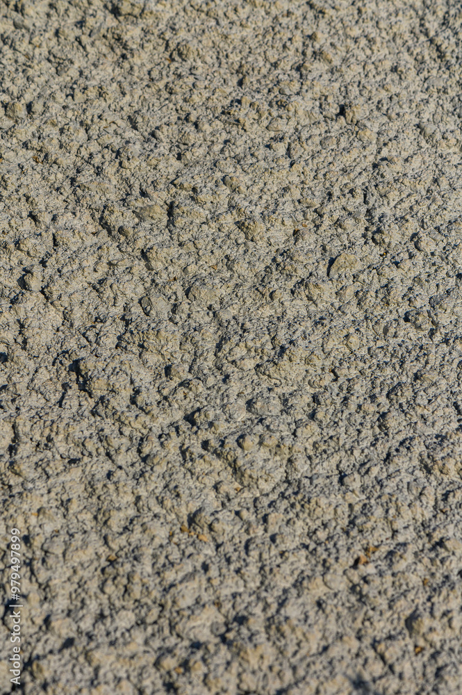 the remains of hardened concrete at a construction site as a background the remains of hardened concrete at a construction site as a background