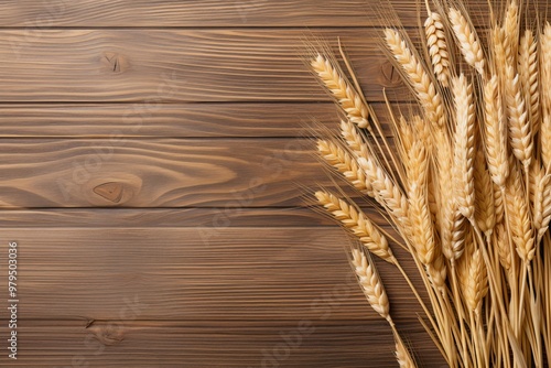 Wheat stalks arranged on rustic wooden surface, capturing the essence of harvest in autumn