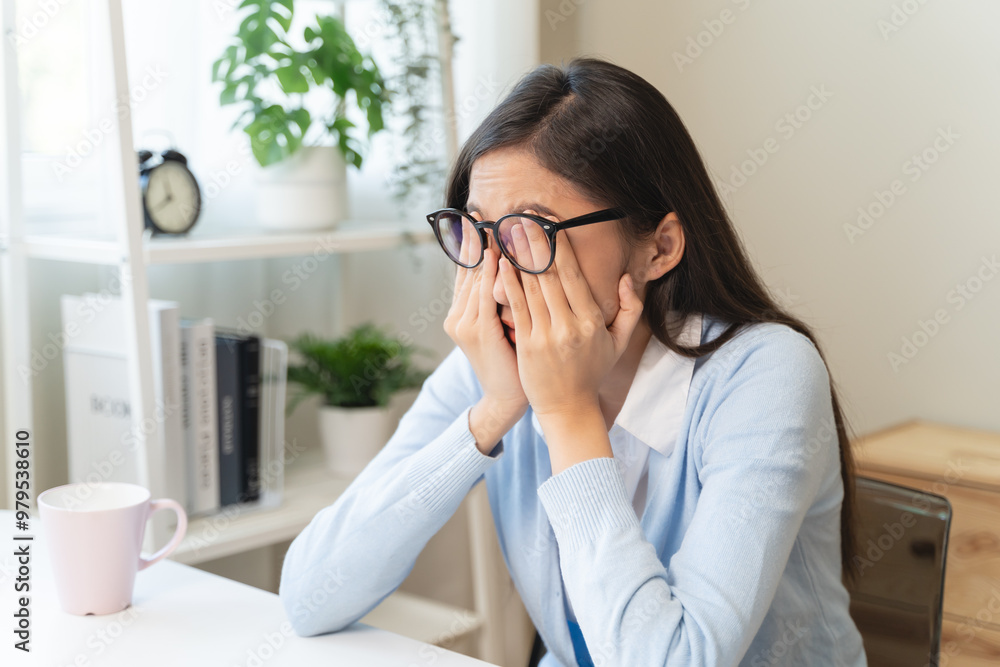 woman taking off glasses tired of computer work suffering from eye strain tension woman taking off glasses tired of computer work suffering from eye strain tension
