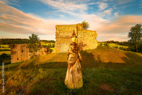 Perimeter walls of the collapsed Borotín castle in the Tábor district in southern Bohemia at sunrise. Photographed by long exposure technique photo