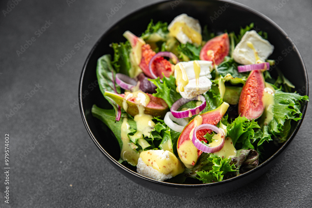fig salad green lettuce, figs, soft cheese fresh meal food snack on the table copy space food background rustic top view keto or paleo diet vegetarian vegan food fig salad green lettuce, figs, soft cheese fresh meal food snack on the table copy space food background rustic top view keto or paleo diet vegetarian vegan food