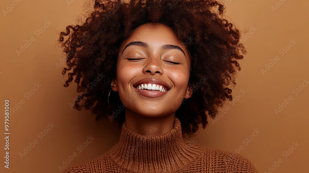 Ecstatic woman with dark skin and curls laughs. Ecstatic woman with dark skin and curls laughs.