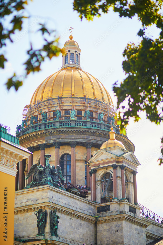 Scenic view of golden dome of St.Isaac's Cathedral in Saint-Petersburg, Russia. Scenic view of golden dome of St.Isaac's Cathedral in Saint-Petersburg, Russia.