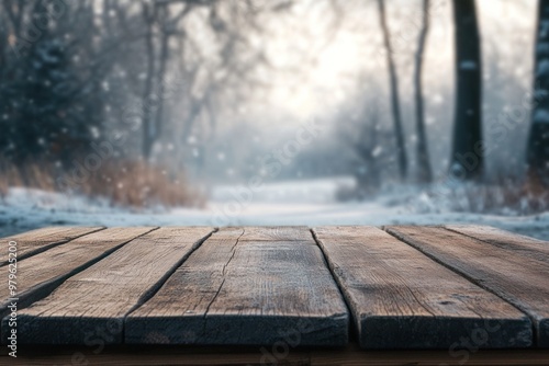 Wooden table with winter forest background snowfall view