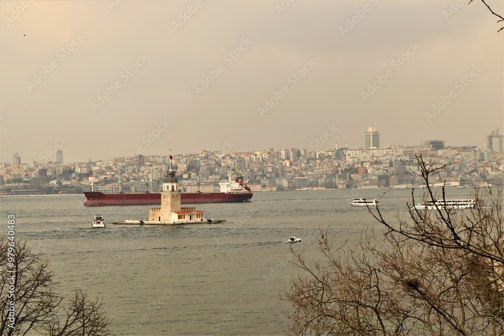 Fototapeta premium Istanbul, Turkey. Maiden 's Tower. in the Strait Bosphorus. girl tower istanbul. Ships in the Strait Bosphorus. Tourist destination in Istanbul, Turkey.