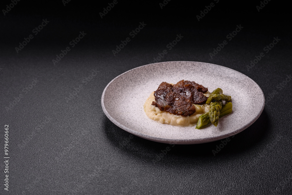 Juicy beef or pork cut into slices with boiled asparagus Juicy beef or pork cut into slices with boiled asparagus