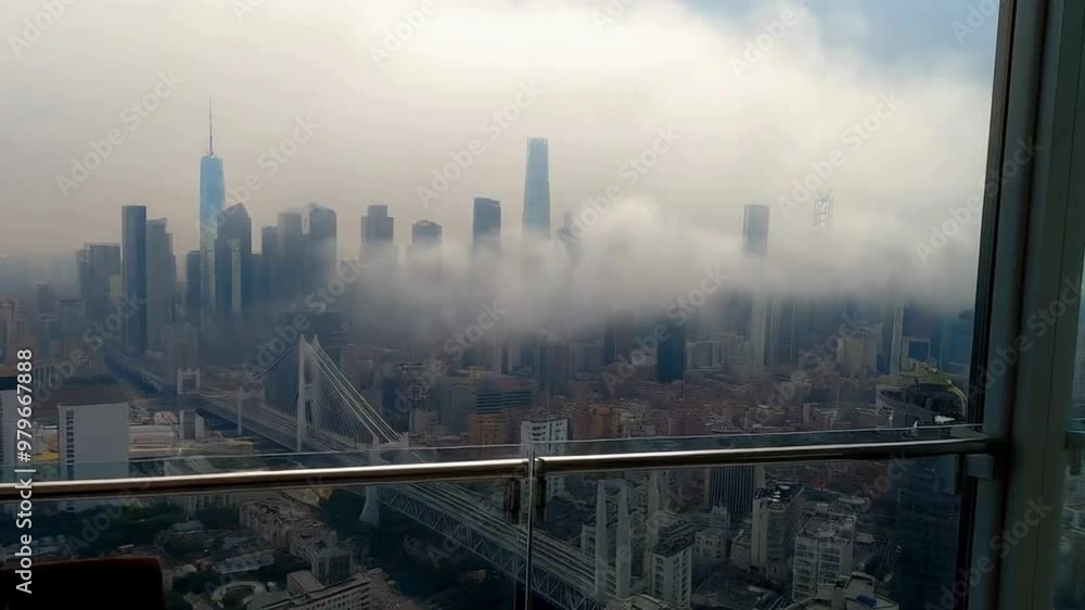 Foggy Cityscape with Brooklyn Bridge and Skyscrapers from High Rise Building Foggy Cityscape with Brooklyn Bridge and Skyscrapers from High Rise Building