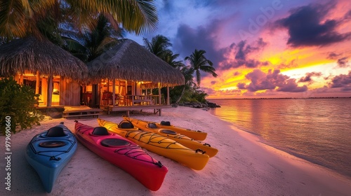 Fototapeta Naklejka Na Ścianę i Meble -  Kayak boat in tropical beach with coconut tree at sunset