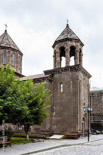 bell tower of black Surb Nshan church in Gyumri photo