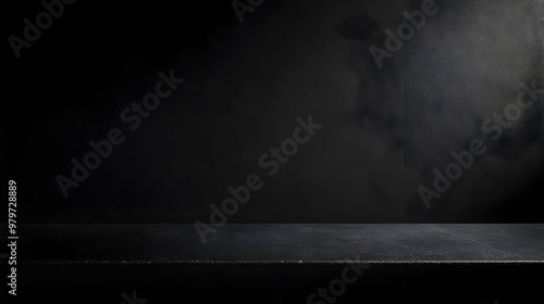 A Dark and Moody Minimalist Black Surface with a Textured Background, Perfect for Product Photography, Mockups, or as a Digital Background for Graphic Design and Presentations.