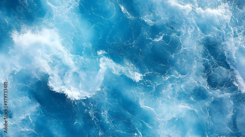 An Aerial View of the Ocean's Surface with Whitecaps and Blue Water, a Natural Abstract Background Texture