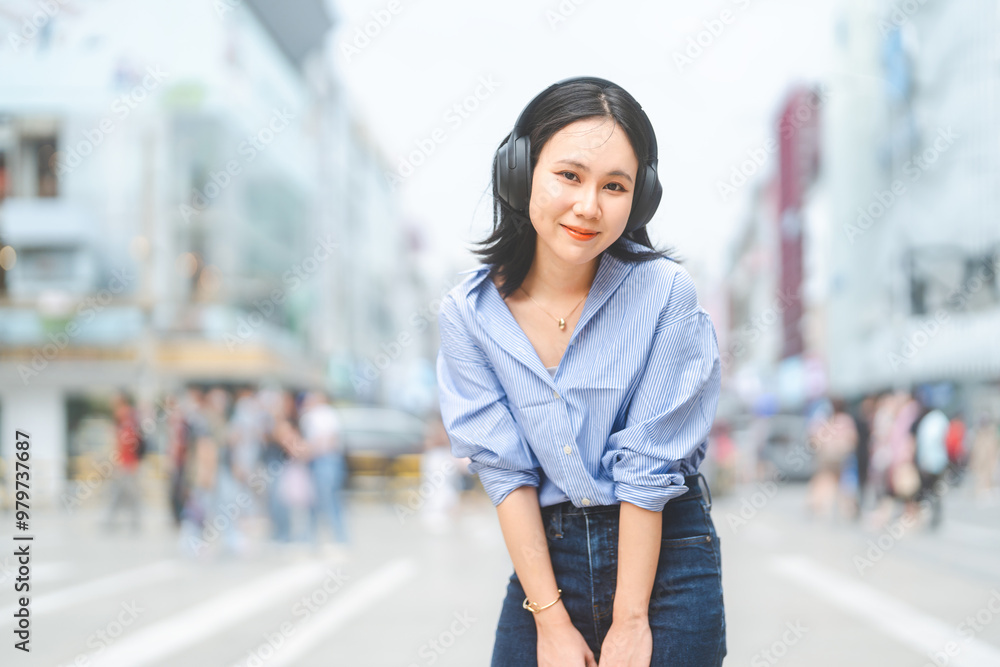 Young adult asian woman wear wireless headphone urban people lifestyles with technology Young adult asian woman wear wireless headphone urban people lifestyles with technology