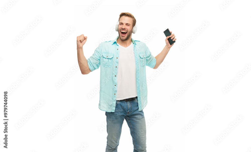 Man in headphones. Man in headphones choosing playlist of mp3 on phone. Man using smart phone application isolated in white. Listening music with phone. Music lifestyle. Audio playlist. Have fun Man in headphones. Man in headphones choosing playlist of mp3 on phone. Man using smart phone application isolated in white. Listening music with phone. Music lifestyle. Audio playlist. Have fun