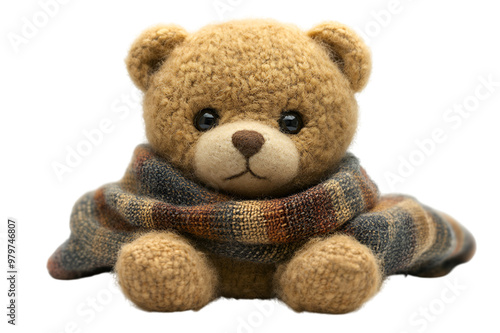 a stuffed teddy bear wearing a scarf. 