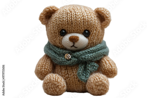 a knitted teddy bear with a scarf. 