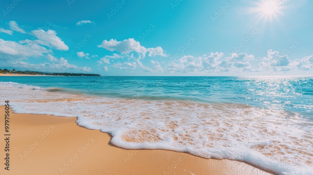 A serene beach scene with golden sand, gentle waves, and a bright blue sky, perfect for summer relaxation and travel inspiration. A serene beach scene with golden sand, gentle waves, and a bright blue sky, perfect for summer relaxation and travel inspiration.