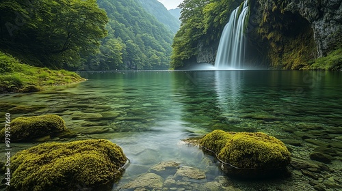 Scenic Mountain Waterfall Cascading Through a Lush Forest Stream