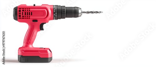 A red power drill with a drill bit in the handle